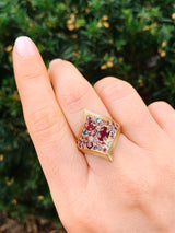 18 karat recycled rose gold ring with rubies, sapphires, diamonds, garnets, tourmaline by fine jewelry designer Capucine H