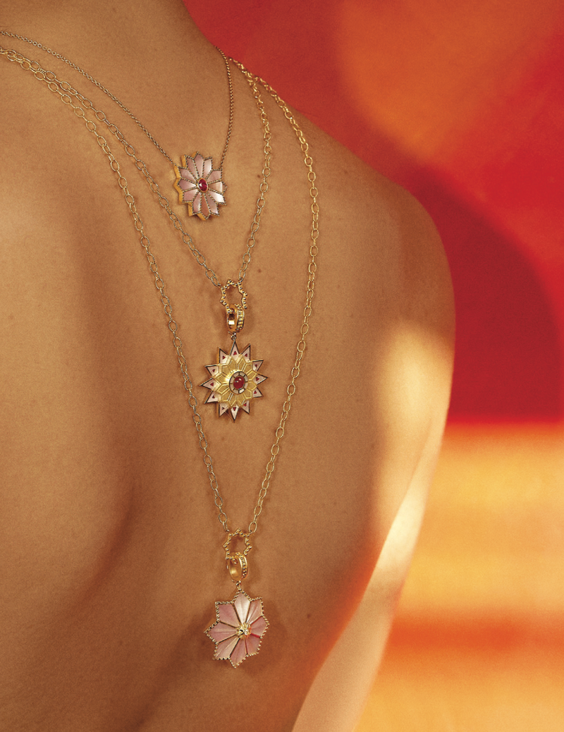 Pink mother of pearl and ruby sacred flower necklace by fine jewelry designer Orly Marcel
