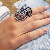 Blue swirl titanium diamond ring by award winning fine jewelry designer Graziela