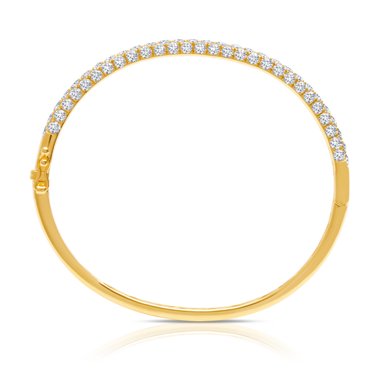 Diamond bangle in 18 karat gold by award winning fine jewelry designer Graziela