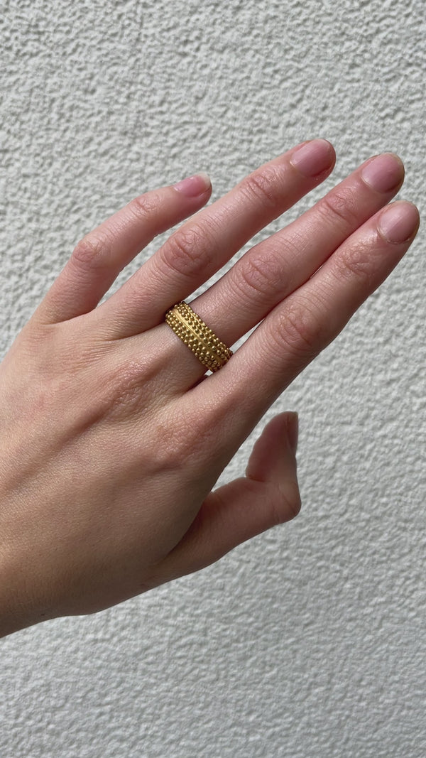 Handcrafted 18 karat recycled yellow gold textured ring by jewelry designer-maker Clio Saskia