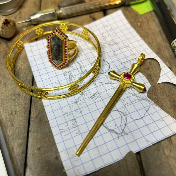 22 karat gold chain with ruby sword pendant by fine jewelry designer Linda Hoj