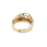 18 karat yellow gold tanzanite ring by fine jewelry designer Tatiana Van Lancker