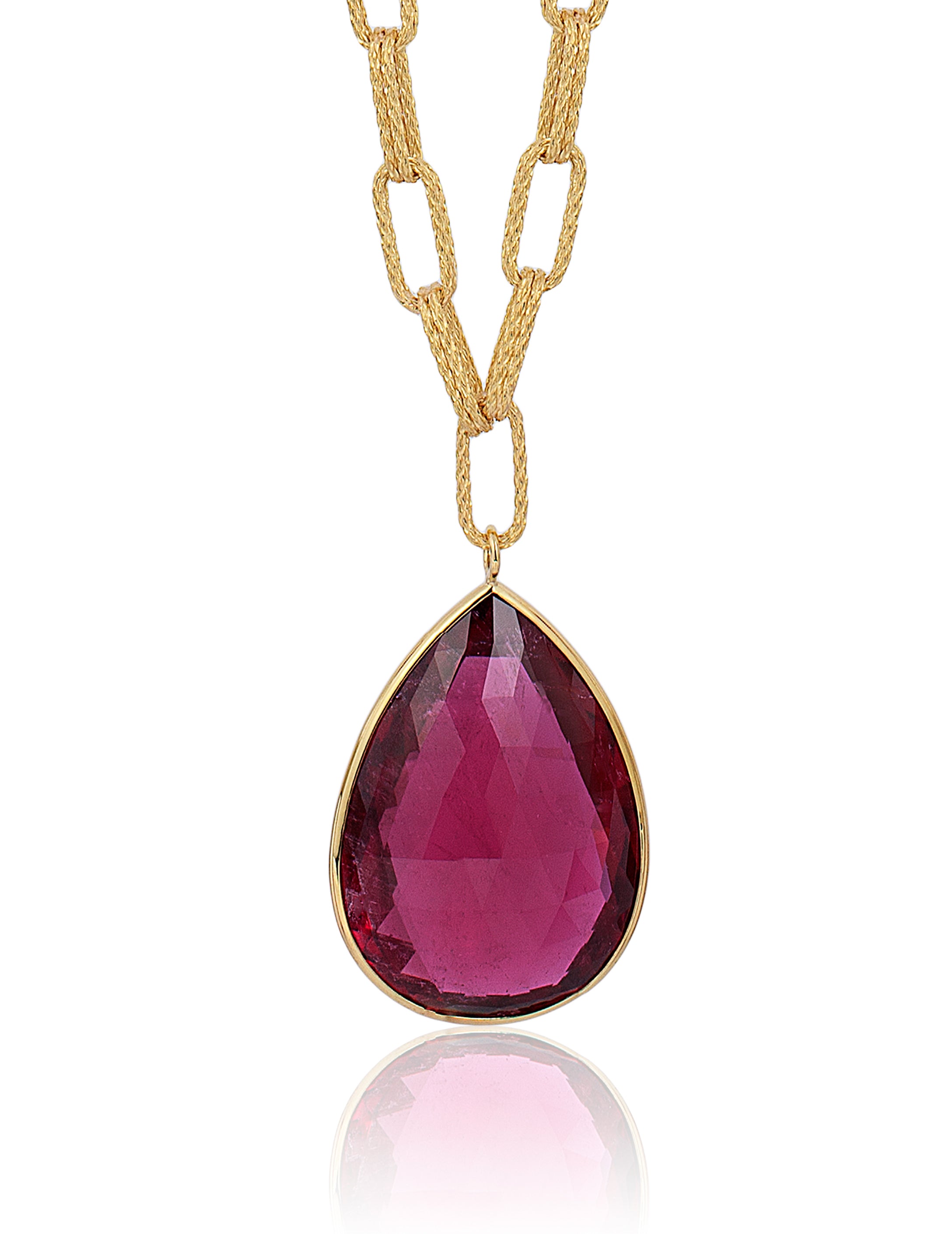 Rubellite pendant with a large texture solid 18 karat gold chain by fine jewelry designer Goshwara